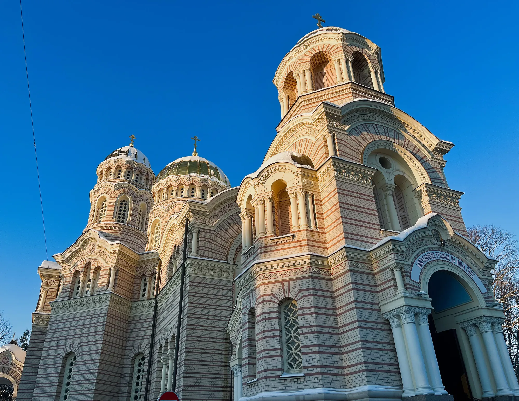 Arched and domed church with stiped stonework