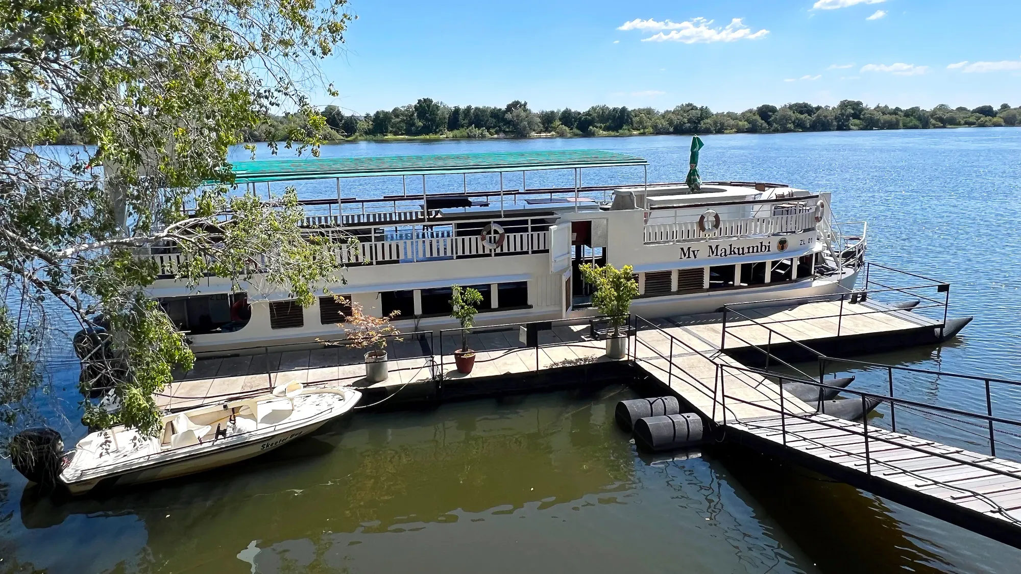 White boat docked in the Zambezi River