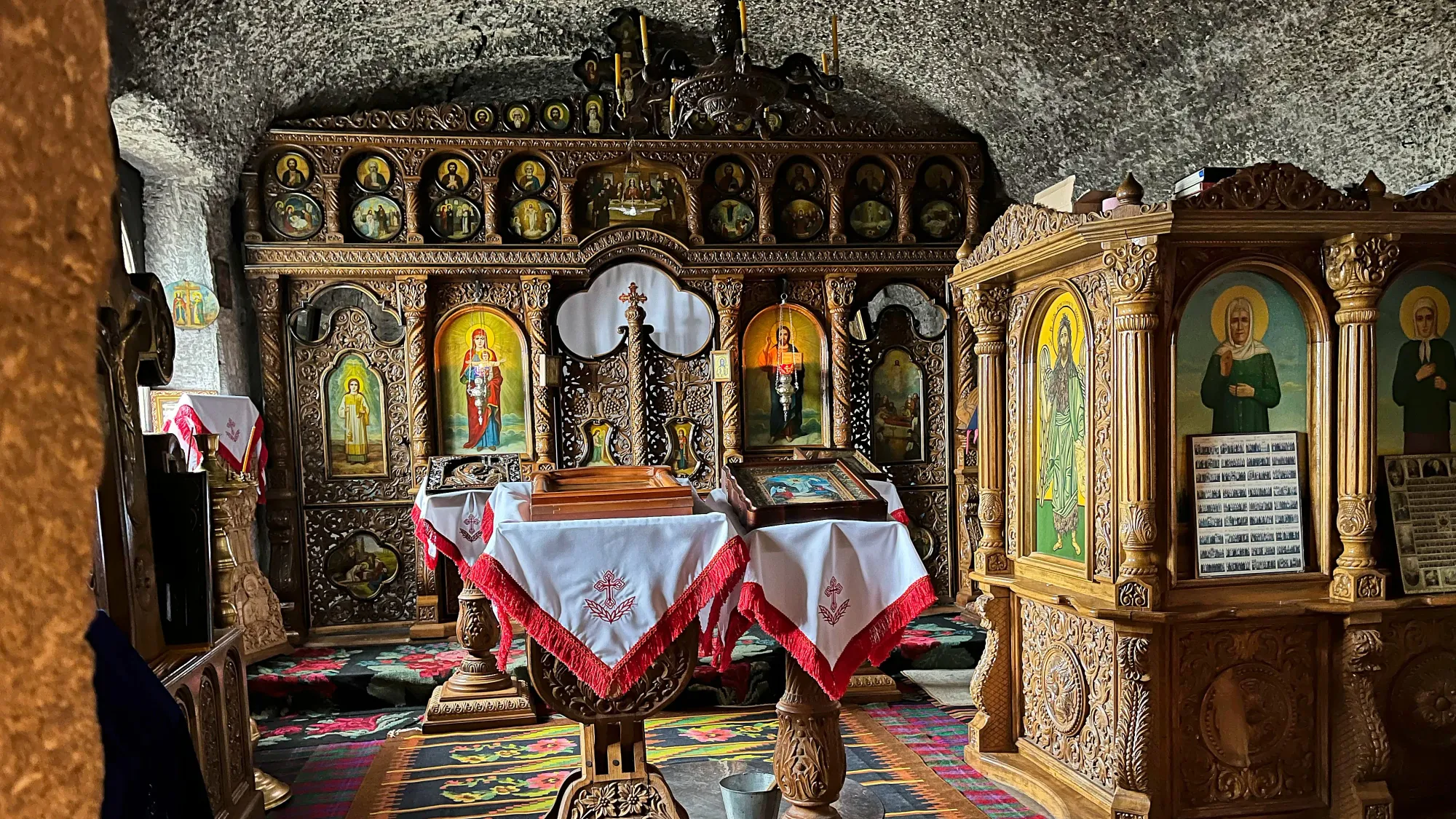 Orthodox altar under a roof carved from the cave