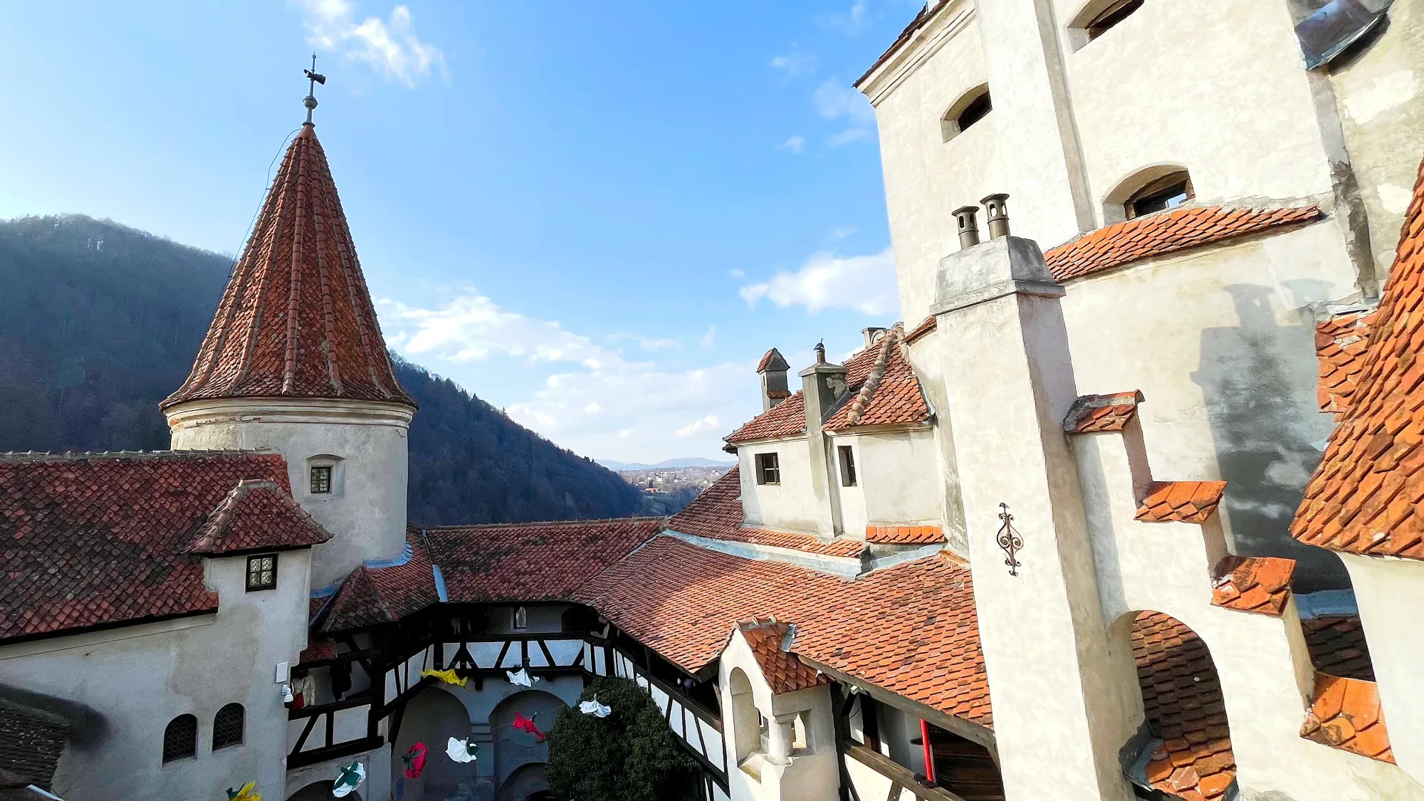 Orange tiled roofs surrounding the top of the castle