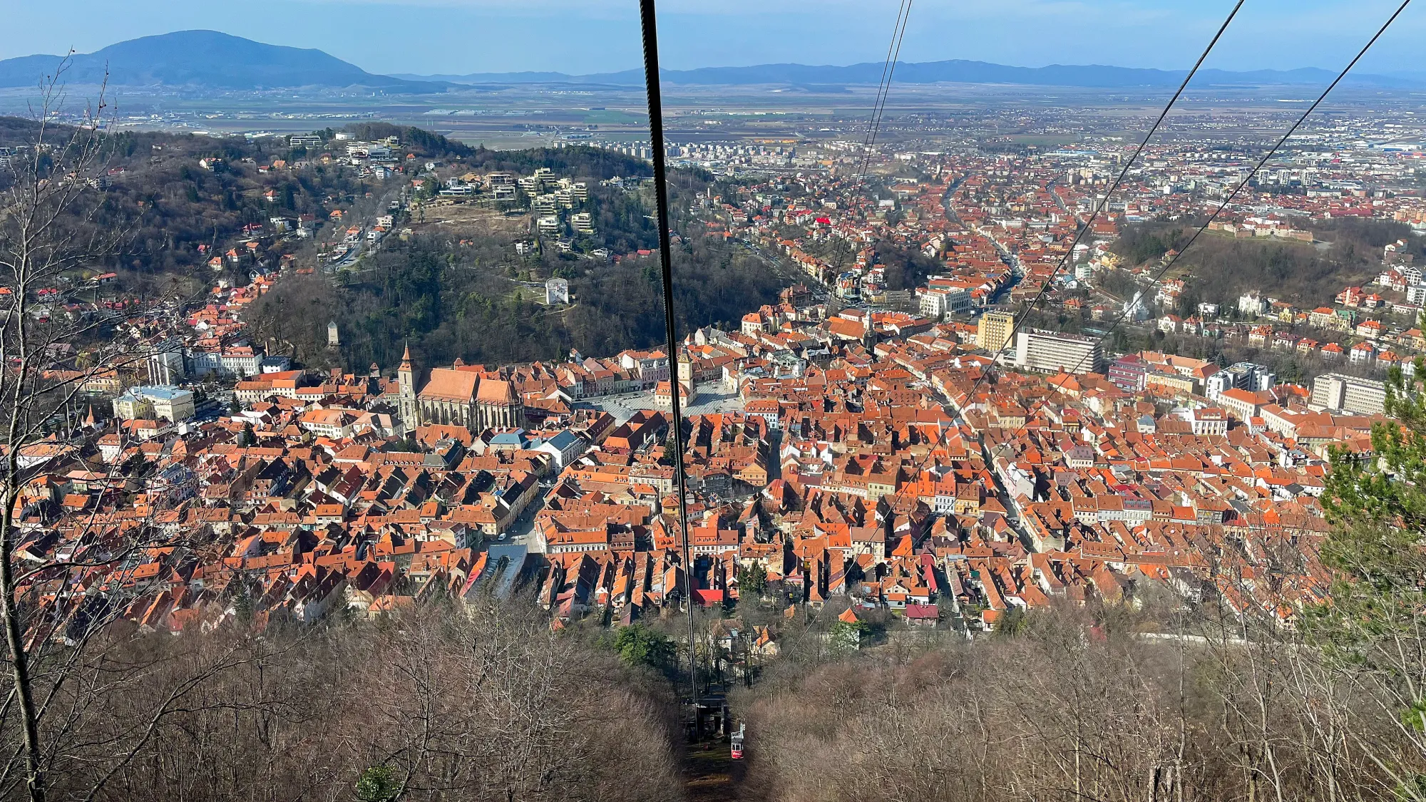 Birds-eye view of the orange roofs in old-town Brașov 