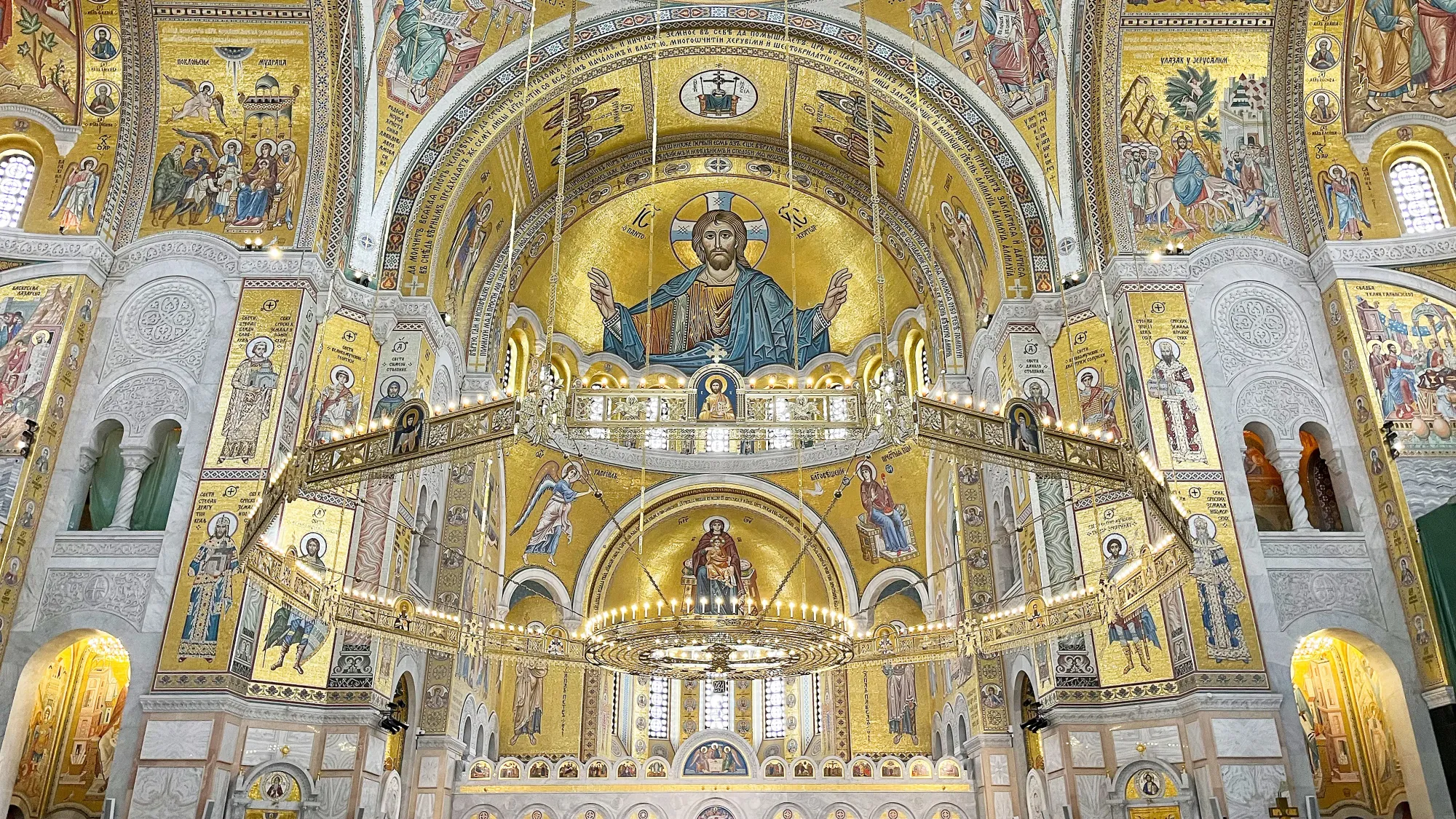 Golden mosaic-ed church ceiling with orthodox imagery